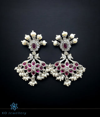 Aahana Silver Kempu Earrings with floral design, ruby stones, and pearls in 92.5% silver.