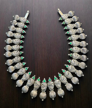 The Ajara Nakshi Silver Peacock Necklace & Earrings (Oxidised)