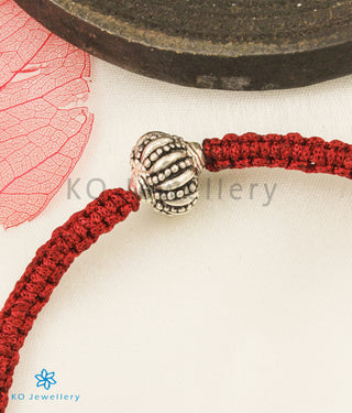 The Gulika Silver Red Thread Bracelet