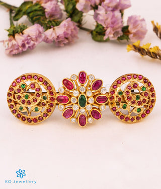 ront view of a bridal hair pin adorned with kempu stones in a South Indian temple design by KO Jewellery.